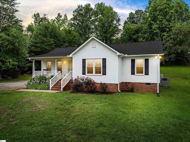 145 Hillside Cir, Easley, SC 29640 - ranch-style home featuring a porch, crawl space, a front lawn, roof with shingles, and central AC unit