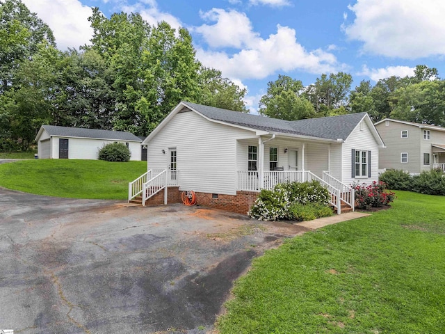 145 Hillside Cir, Easley, SC 29640 - view of front facade featuring a porch, crawl space, a front lawn, an outbuilding, and a shingled roof