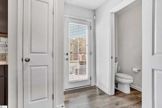 709 Bolsover Way, Woodruff, SC 29388 - bathroom featuring toilet, wood finished floors, vanity, and baseboards