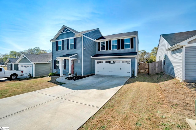 709 Bolsover Way, Woodruff, SC 29388 - view of front of home featuring concrete driveway, an attached garage, and board and batten siding