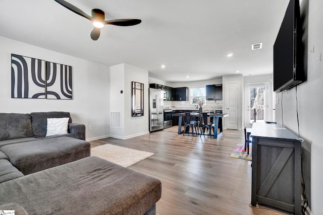 709 Bolsover Way, Woodruff, SC 29388 - living area with ceiling fan, light wood-style floors, recessed lighting, and baseboards