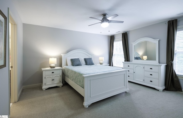 116 Legends Way, Simpsonville, SC 29681 - bedroom with light carpet, baseboards, and ceiling fan
