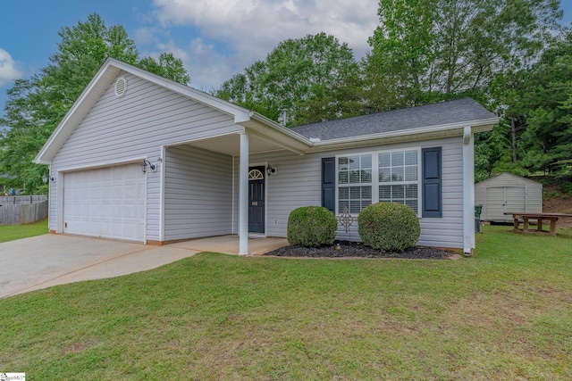 106 Felix Ct, Easley, SC 29640 - ranch-style house featuring a storage unit, an attached garage, and driveway