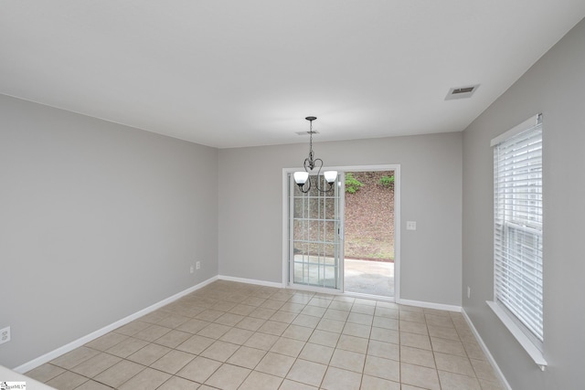 106 Felix Ct, Easley, SC 29640 - unfurnished room with a chandelier, baseboards, and light tile patterned floors