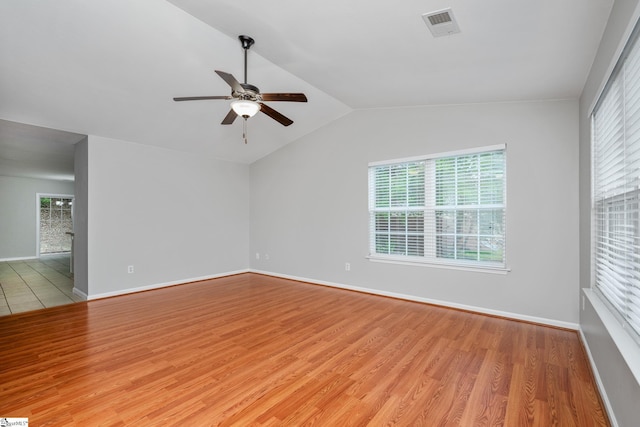 106 Felix Ct, Easley, SC 29640 - empty room featuring a ceiling fan, light wood finished floors, healthy amount of natural light, and lofted ceiling