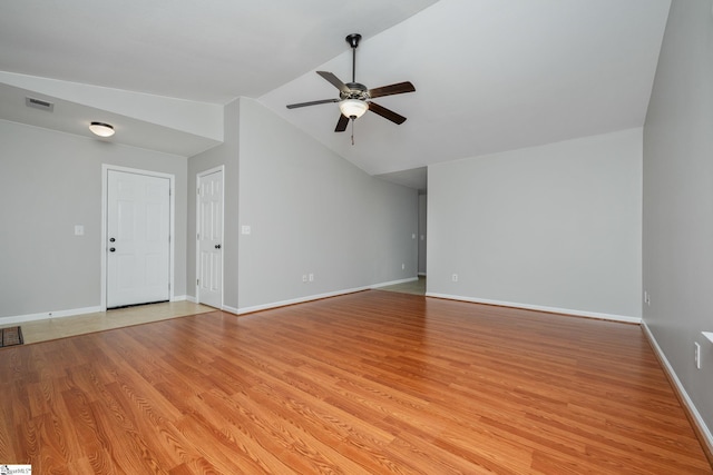 106 Felix Ct, Easley, SC 29640 - unfurnished living room featuring a ceiling fan, light wood-style floors, lofted ceiling, and baseboards