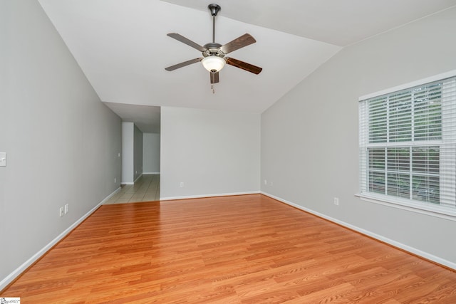 106 Felix Ct, Easley, SC 29640 - unfurnished room with lofted ceiling, a ceiling fan, light wood-style floors, and baseboards