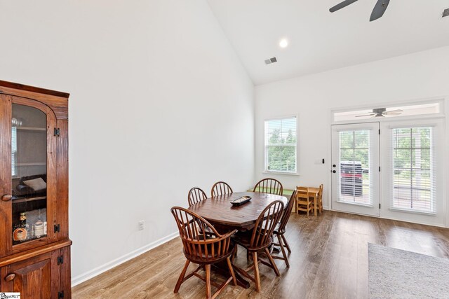 113 Noble St, Greer, SC 29651 - dining area with ceiling fan, light wood-style flooring, high vaulted ceiling, and baseboards