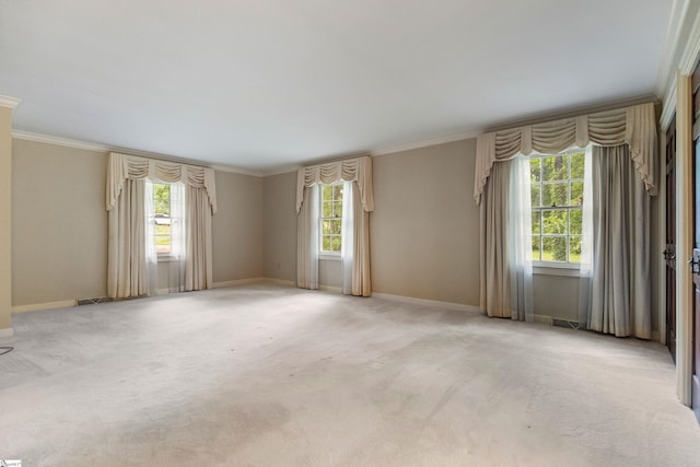 21 Kensington Rd, Greenville, SC 29617 - empty room featuring healthy amount of natural light, crown molding, baseboards, and light carpet