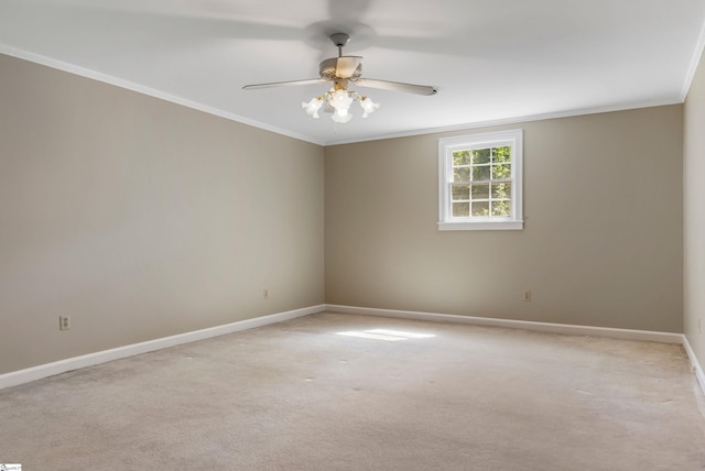 21 Kensington Rd, Greenville, SC 29617 - spare room with ornamental molding, ceiling fan, baseboards, and light colored carpet