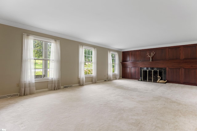 21 Kensington Rd, Greenville, SC 29617 - unfurnished living room featuring ornamental molding, a fireplace, light carpet, and baseboards
