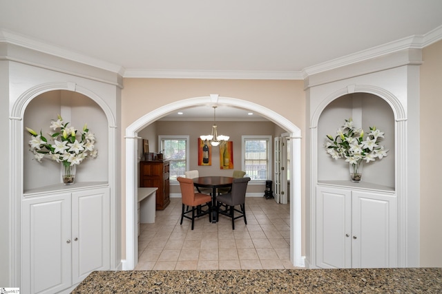3 Swamp Lily Ct, Simpsonville, SC 29681 - dining room featuring a chandelier, arched walkways, light tile patterned flooring, ornamental molding, and baseboards