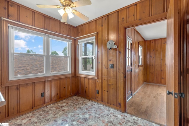 611 E S 6th St, Seneca, SC 29678 - empty room featuring wooden walls, ceiling fan, and baseboards