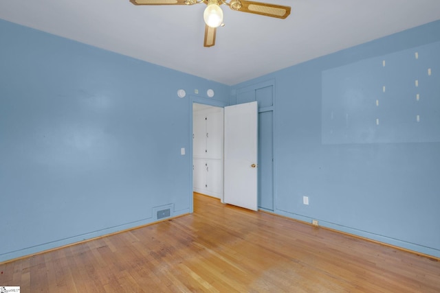 611 E S 6th St, Seneca, SC 29678 - spare room featuring ceiling fan, wood finished floors, and baseboards