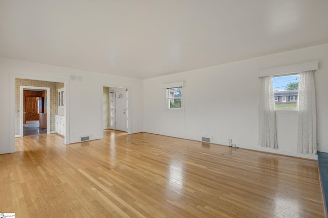 611 E S 6th St, Seneca, SC 29678 - empty room featuring light wood-type flooring and baseboards