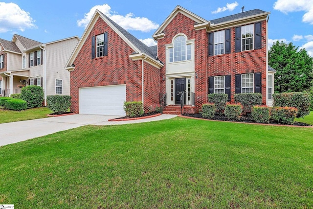 100 Beason Farm Ln, Simpsonville, SC 29681 - view of front of home featuring brick siding, an attached garage, concrete driveway, and a front lawn