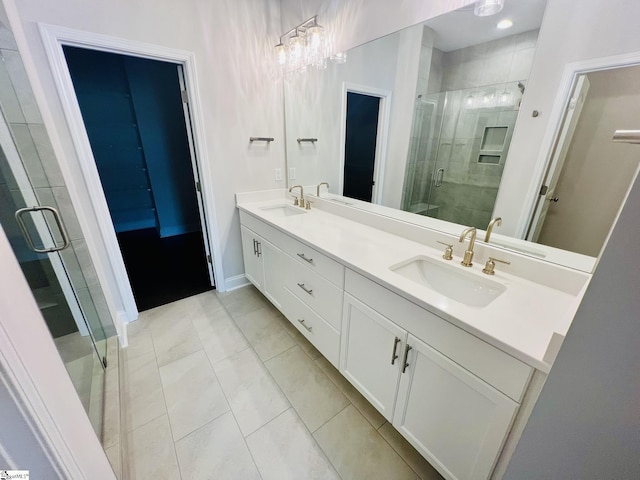47 Hensley Rd Unit 58, Greenville, SC 29607 - bathroom with double vanity, a shower stall, and baseboards
