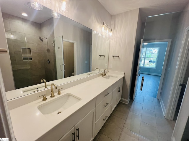 47 Hensley Rd Unit 58, Greenville, SC 29607 - full bathroom with a stall shower, double vanity, toilet, tile patterned flooring, and baseboards