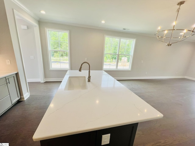 47 Hensley Rd Unit 58, Greenville, SC 29607 - kitchen featuring a sink, ornamental molding, baseboards, a chandelier, and plenty of natural light
