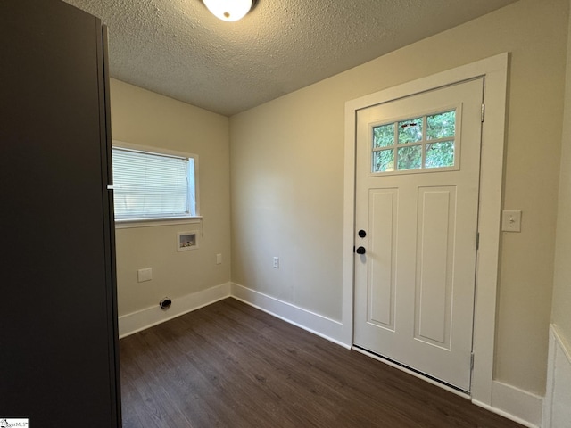 800 W Hampton St, Laurens, SC 29360 - foyer featuring healthy amount of natural light, dark wood-style floors, a textured ceiling, and baseboards