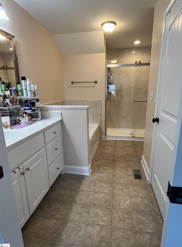 383 Amelia Springs Ln, Moore, SC 29369 - bathroom featuring vanity, a bath, a stall shower, and recessed lighting