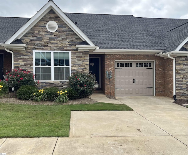 383 Amelia Springs Ln, Moore, SC 29369 - view of front of home featuring concrete driveway, stone siding, and a shingled roof