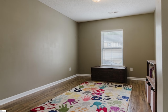 48 Border Ave, Simpsonville, SC 29680 - interior space with dark wood-type flooring, baseboards, and a textured ceiling