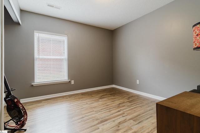 48 Border Ave, Simpsonville, SC 29680 - spare room with wood finished floors and baseboards