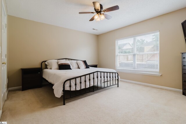 48 Border Ave, Simpsonville, SC 29680 - bedroom with light colored carpet, baseboards, and ceiling fan