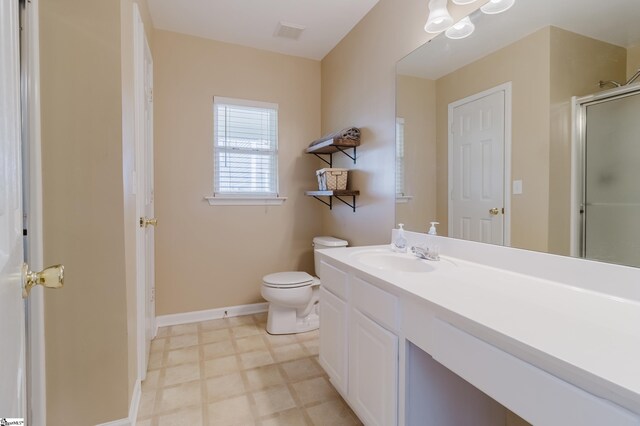48 Border Ave, Simpsonville, SC 29680 - full bath with tile patterned floors, vanity, a shower with door, toilet, and baseboards