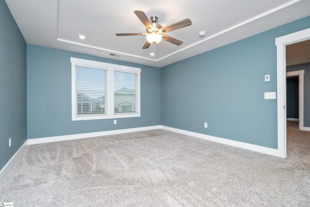 108 Pewter Cir, Simpsonville, SC 29680 - carpeted empty room with a ceiling fan, baseboards, a smoke detector, and a tray ceiling