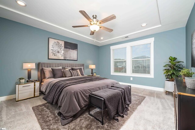 108 Pewter Cir, Simpsonville, SC 29680 - bedroom featuring light carpet, baseboards, a tray ceiling, and recessed lighting