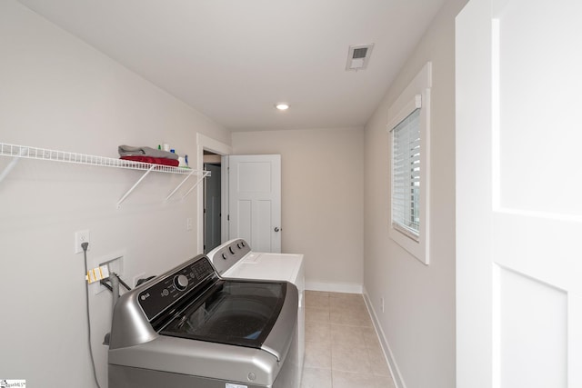108 Pewter Cir, Simpsonville, SC 29680 - laundry room featuring washing machine and clothes dryer, light tile patterned floors, baseboards, and recessed lighting