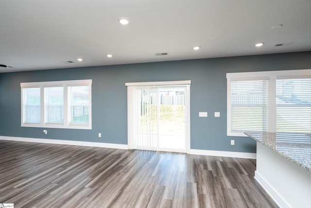 108 Pewter Cir, Simpsonville, SC 29680 - spare room with dark wood finished floors, healthy amount of natural light, baseboards, and recessed lighting