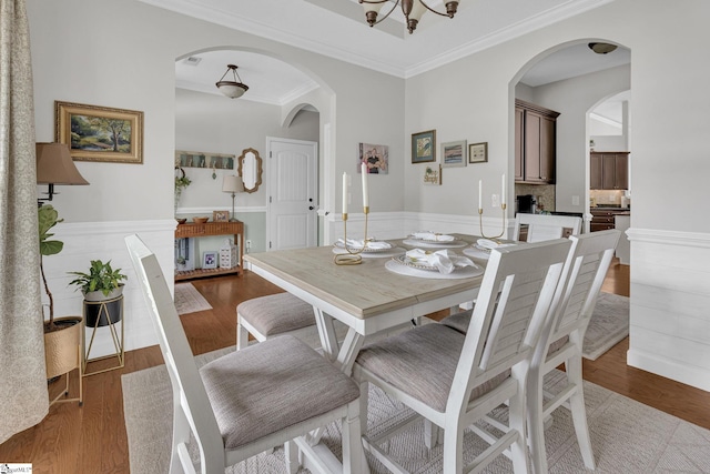 204 Medoc Ln, Moore, SC 26369 - dining area with crown molding, wood finished floors, and arched walkways