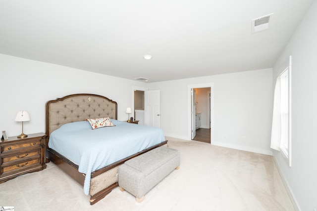 800 Redmill Ln, Duncan, SC 29334 - bedroom featuring light colored carpet, baseboards, and connected bathroom