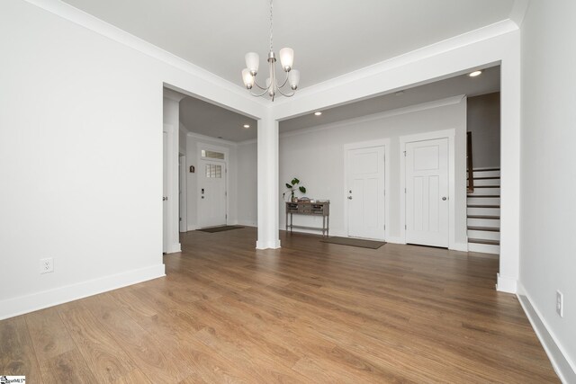 800 Redmill Ln, Duncan, SC 29334 - unfurnished room featuring stairway, a chandelier, baseboards, wood finished floors, and recessed lighting