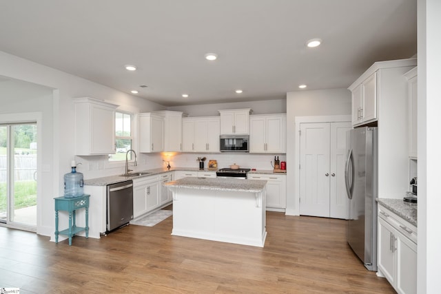 800 Redmill Ln, Duncan, SC 29334 - kitchen featuring appliances with stainless steel finishes, a sink, white cabinetry, and recessed lighting