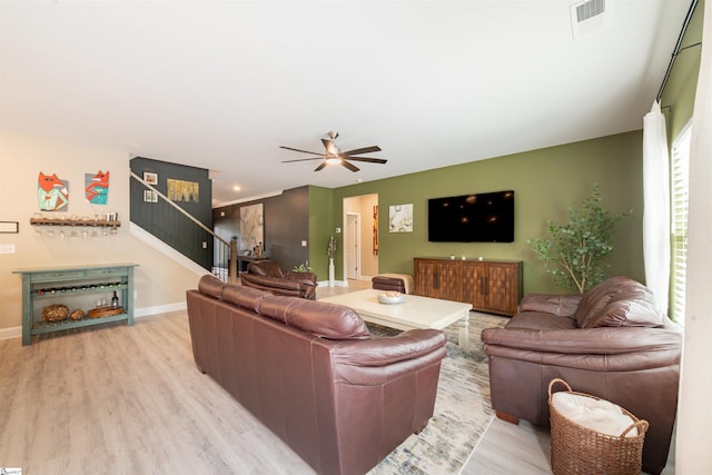 345 Cypress Hollow Trl, Piedmont, SC 29673 - living room featuring light wood-style floors, stairs, a ceiling fan, and baseboards