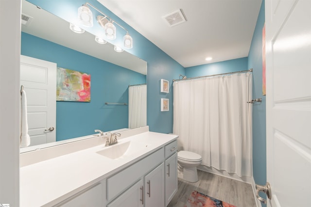 345 Cypress Hollow Trl, Piedmont, SC 29673 - bathroom with vanity, wood finished floors, and toilet