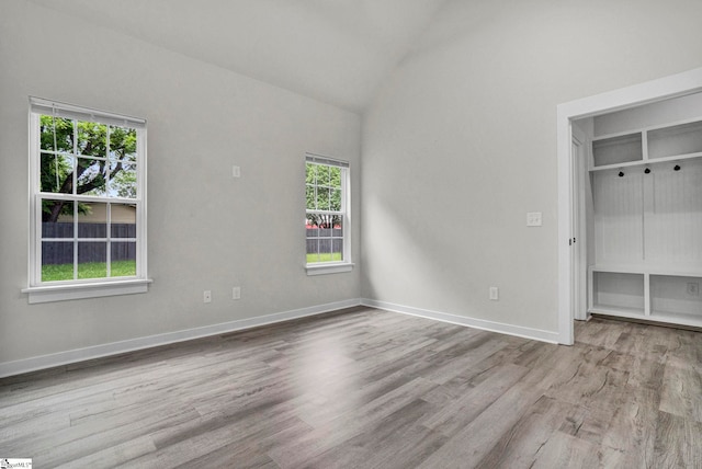 1708 Old Georgia Hwy, Gaffney, SC 29341 - unfurnished bedroom featuring wood finished floors, lofted ceiling, and baseboards