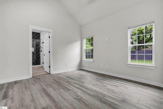 1708 Old Georgia Hwy, Gaffney, SC 29341 - spare room with high vaulted ceiling, wood finished floors, and baseboards