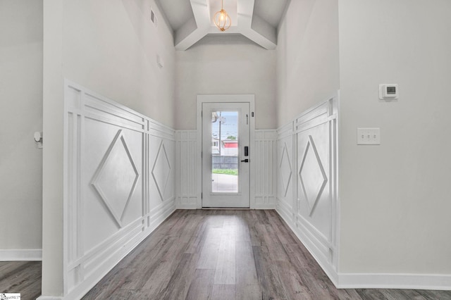 1708 Old Georgia Hwy, Gaffney, SC 29341 - doorway to outside featuring a decorative wall, wood finished floors, a wainscoted wall, a high ceiling, and a chandelier