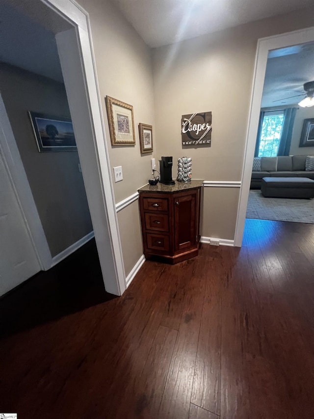 9 Lee St, Liberty, SC 29657 - hallway featuring dark wood-style floors and baseboards
