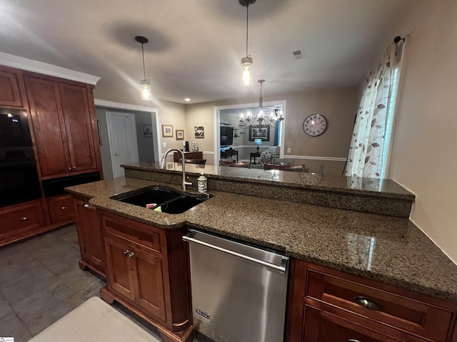 9 Lee St, Liberty, SC 29657 - kitchen with stainless steel appliances, a sink, dark stone countertops, hanging light fixtures, and a chandelier