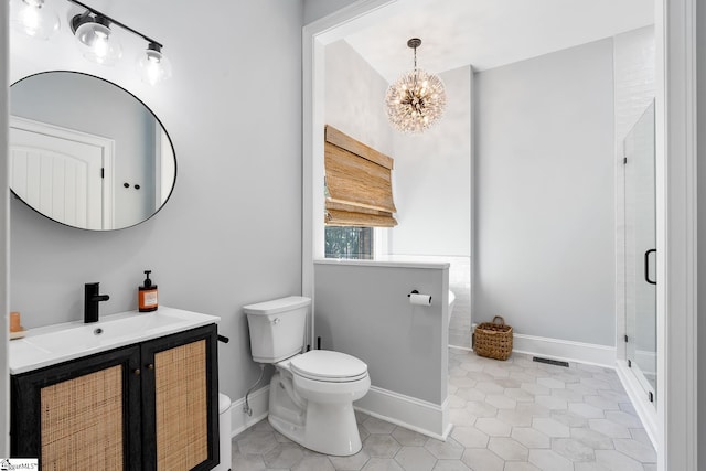 416 Shirley Cir, Pendleton, SC 29625 - bathroom with toilet, vanity, a shower stall, and baseboards