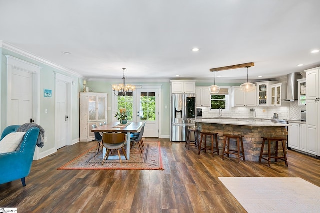 416 Shirley Cir, Pendleton, SC 29625 - dining room featuring a chandelier, baseboards, healthy amount of natural light, dark wood-style flooring, and ornamental molding