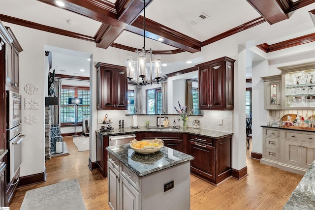 172 Ridgeland Dr # 101, Greenville, SC 29601 - kitchen featuring a sink, tasteful backsplash, beam ceiling, light wood-style flooring, and ornamental molding