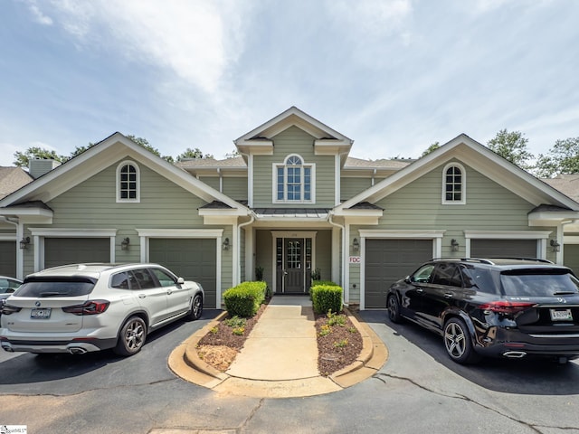 172 Ridgeland Dr # 101, Greenville, SC 29601 - view of front of house with driveway and a standing seam roof