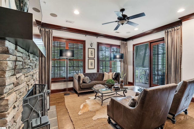 172 Ridgeland Dr # 101, Greenville, SC 29601 - living room with ornamental molding, a ceiling fan, baseboards, wood finished floors, and recessed lighting